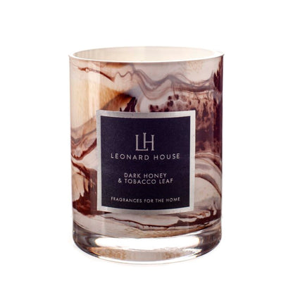 Dark Honey and Tobacco Scented Candle in a brown swirl pattern glass