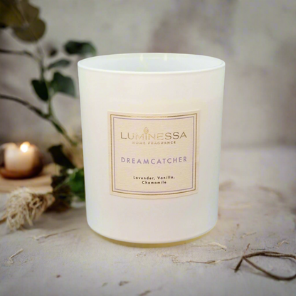 Luminessa Dreamcatcher candle on a neutral background with soft lighting